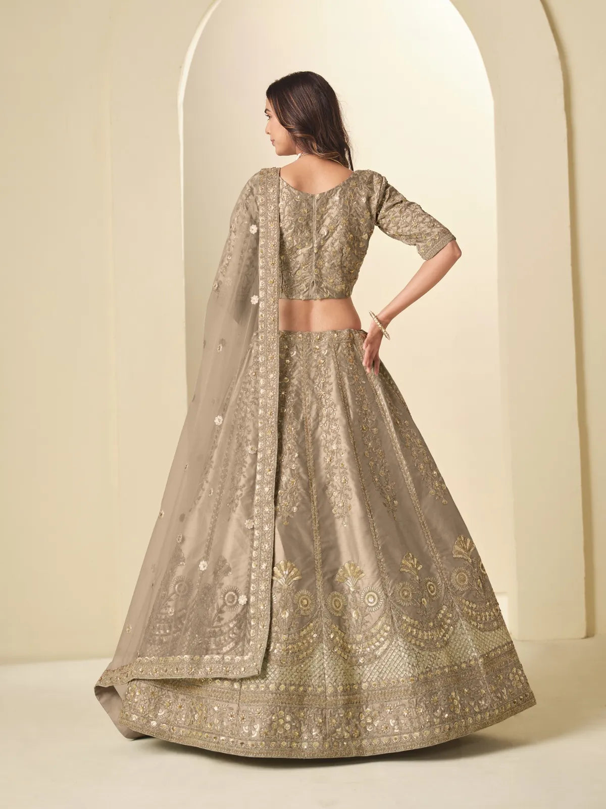 Tarani art silk beige lehenga back view with blouse design and dupatta fall