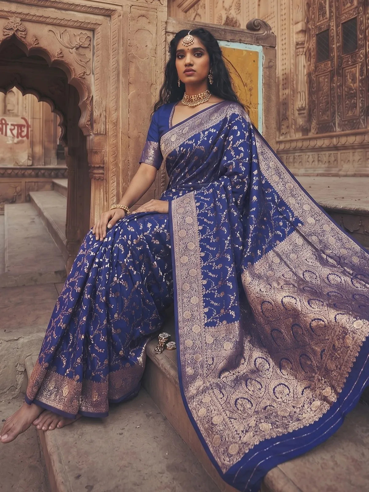 Tarani Kalika navy blue Art Silk saree front view with elegant zari pallu and woven border