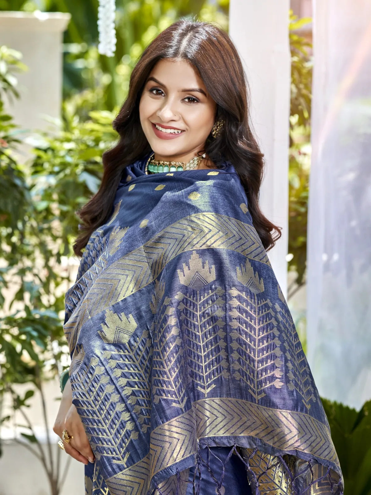 Tarani navy blue Assam silk saree upper body view showcasing intricate zari design