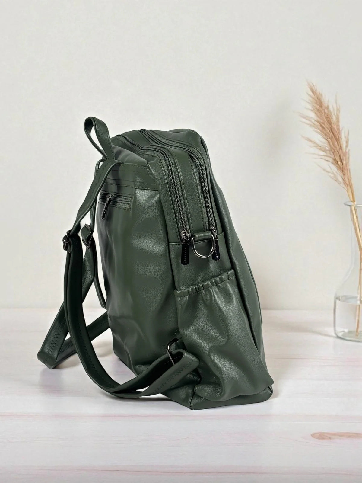 Tarani elegant PU leather backpack side view with pockets