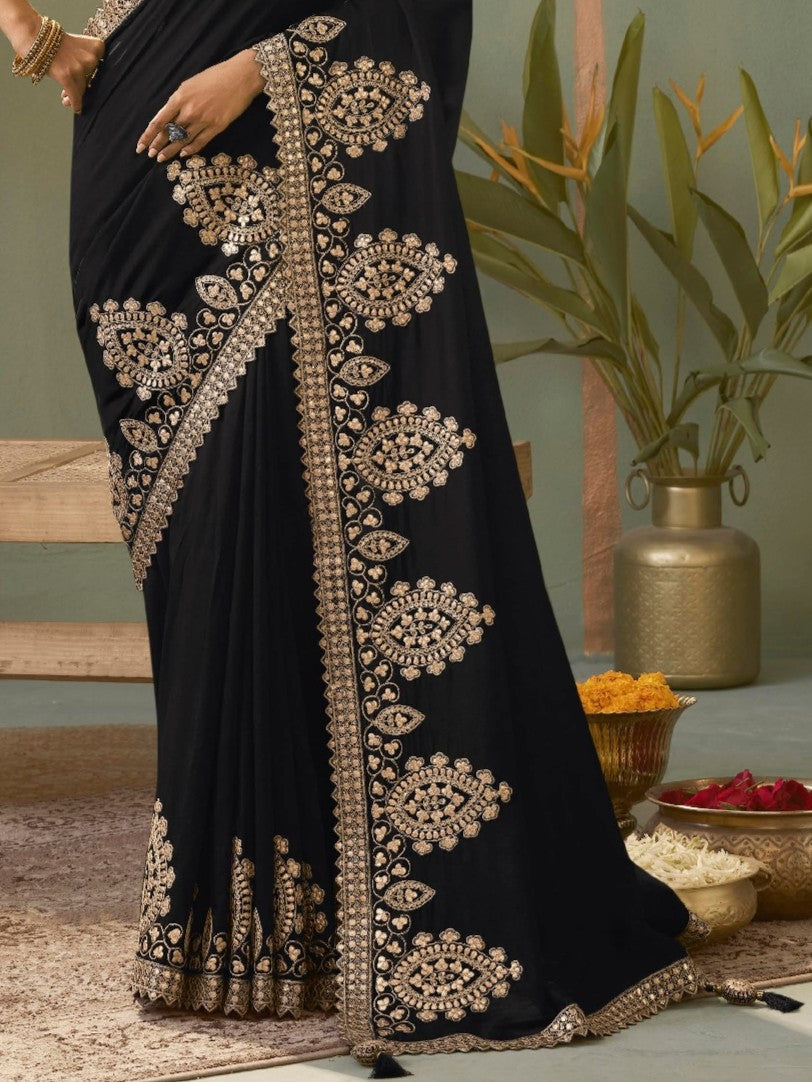 Tarani black bamber silk saree border and pallu closeup view showing golden embroidery