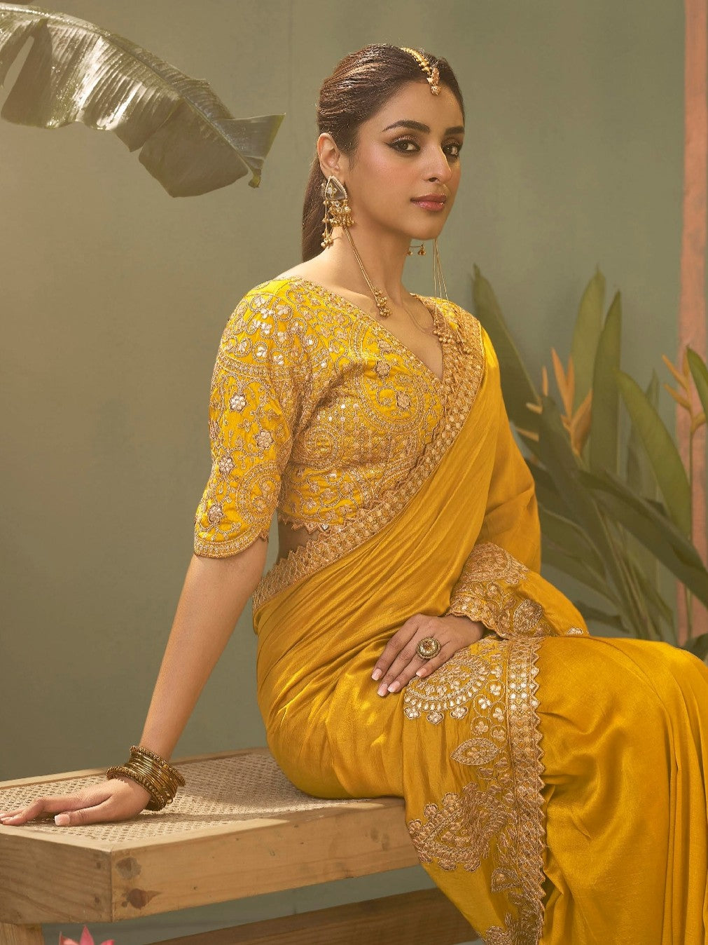 Tarani elegant yellow bamber silk saree upper body view with detailed embroidery blouse