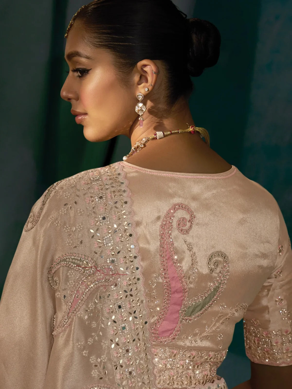Tarani beige banarasi saree blouse view with detailed embroidery and back design