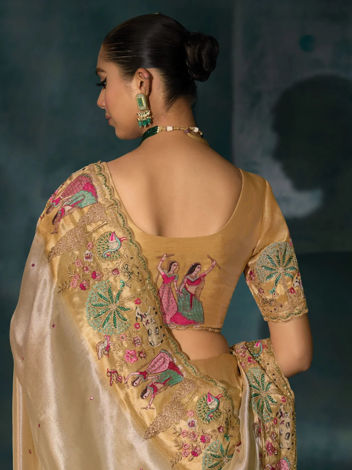 Tarani golden Banarasi saree back blouse view with embroidered detailing