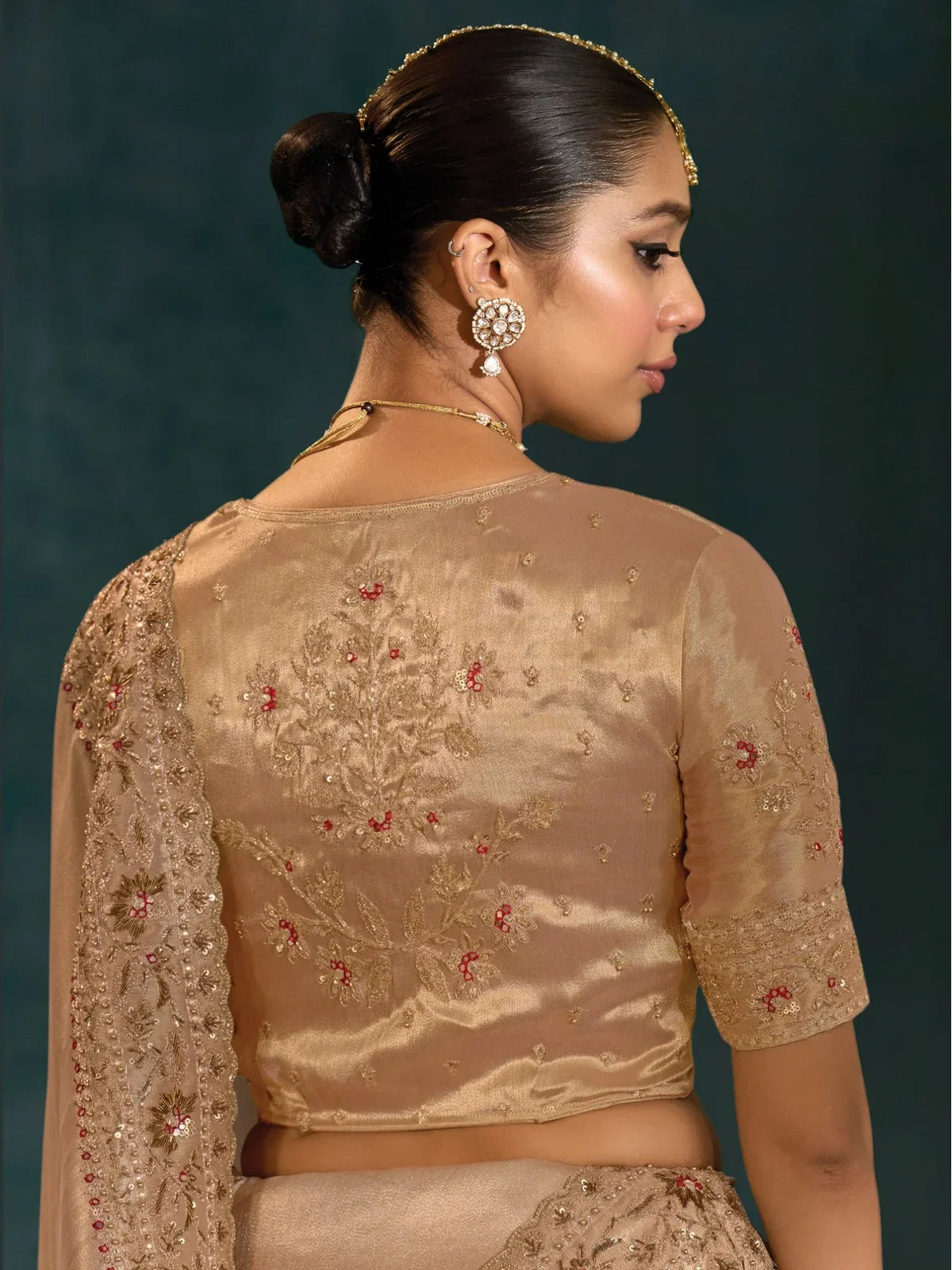 Tarani golden banarasi saree back blouse view with detailed embroidery work