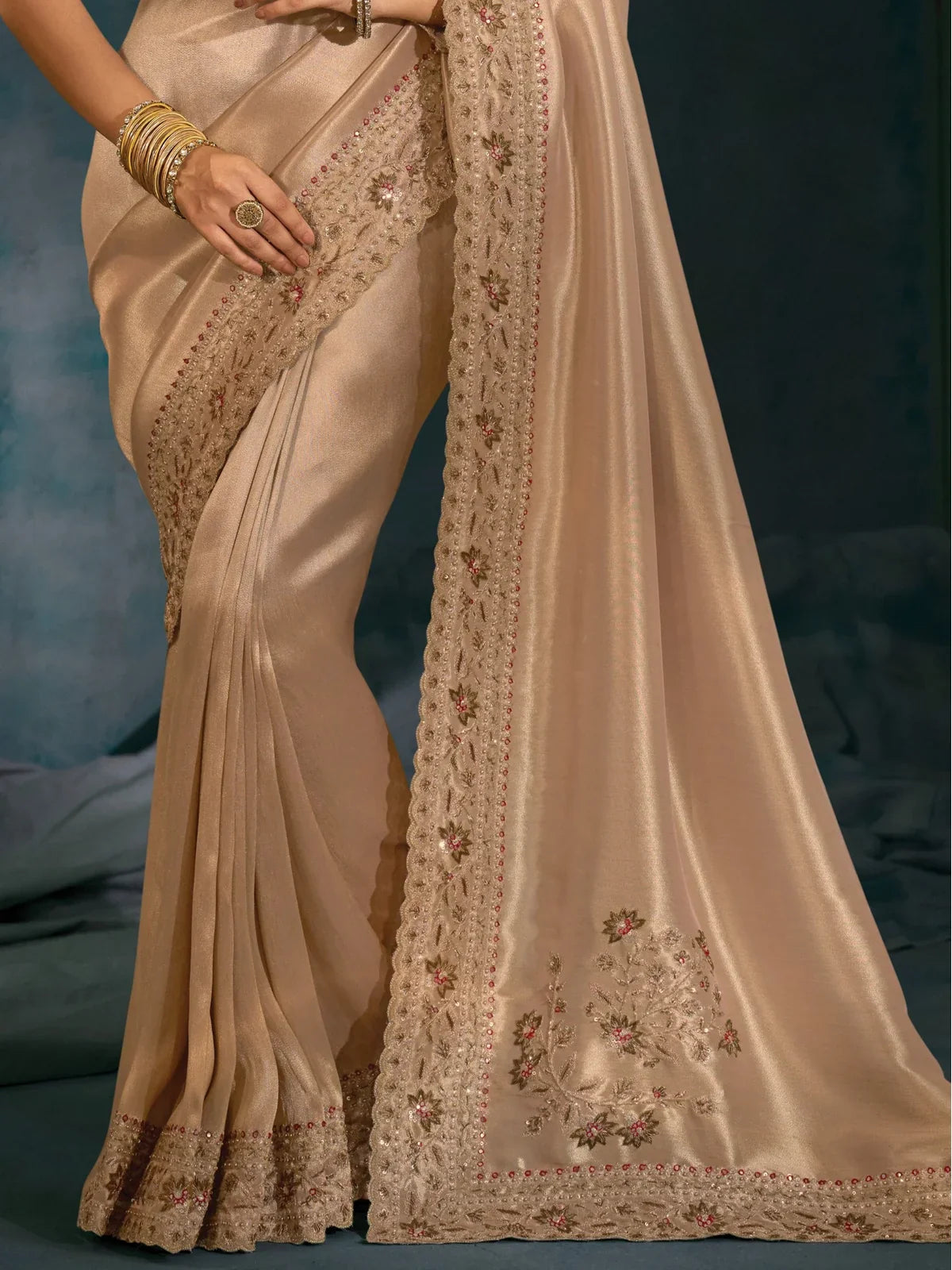 Tarani golden banarasi saree pallu and border closeup with heavy embroidery