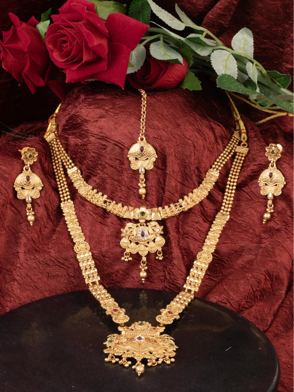 Tarani gold plated bridal jewellery set with necklace earrings and maang tikka for weddings