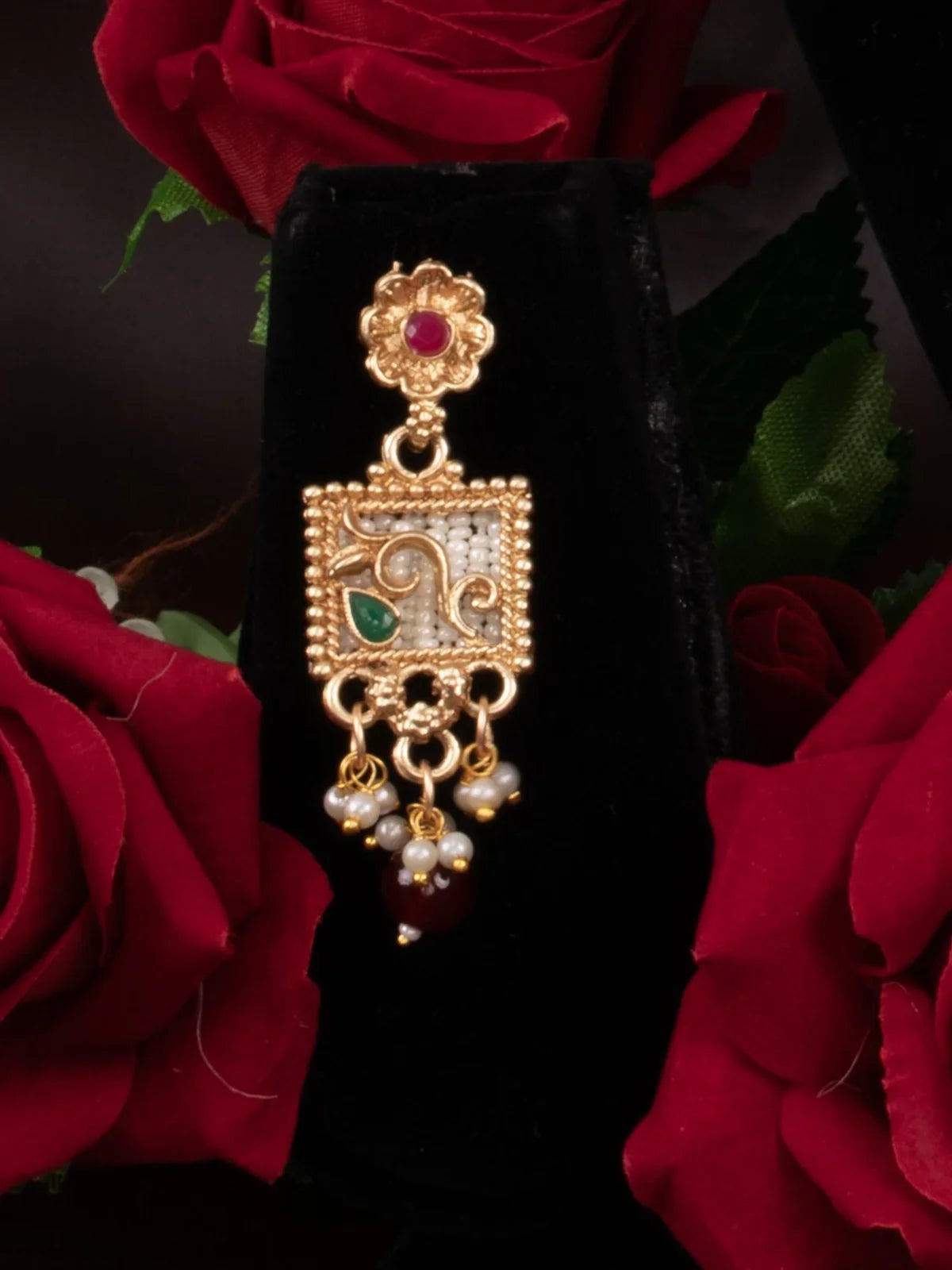 Tarani bridal set matching earrings with pearl and gold design for festive occasions