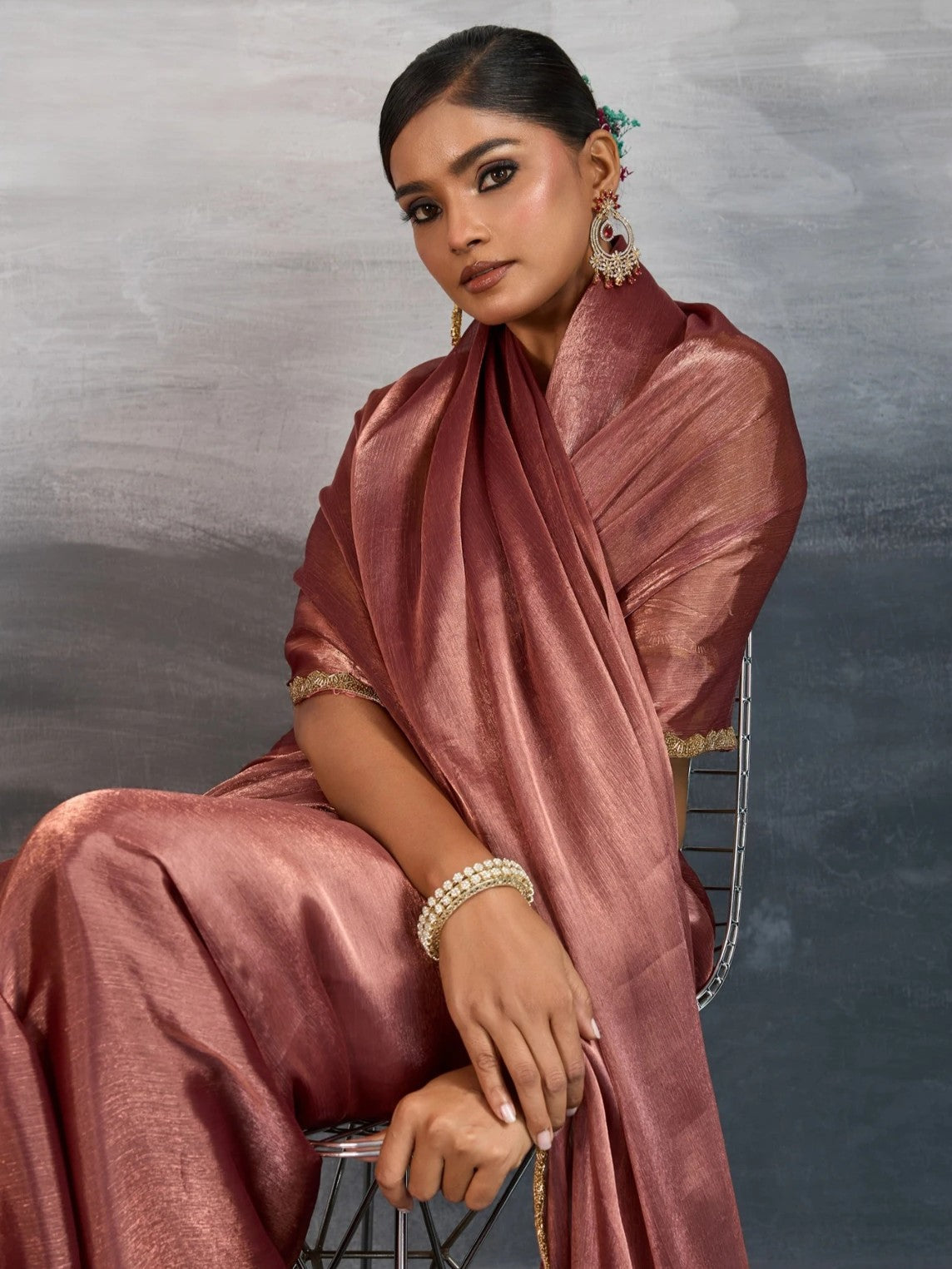 Tarani premium brown chiffon saree close-up showing blouse and fabric shine for parties