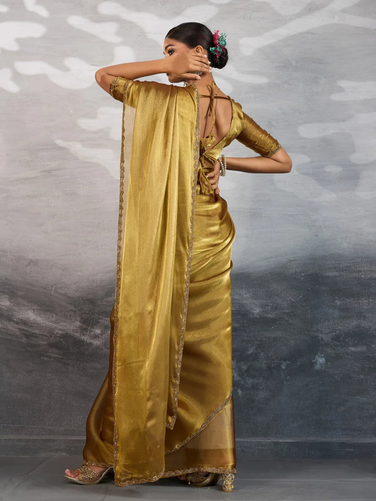Tarani golden chiffon saree with lace border showing full back drape view