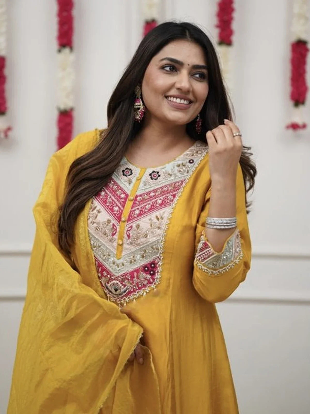 Tarani yellow chanderi festive wear dress showing upper embroidery and sleeves