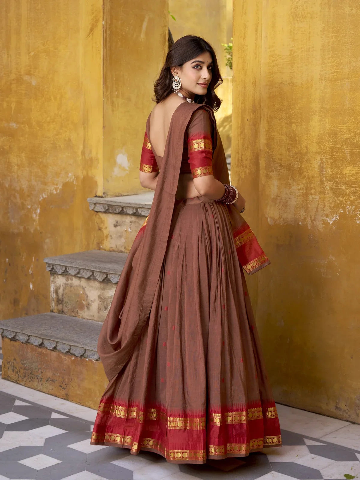 Tarani brown chanderi lehenga back view with red and golden zari detailing