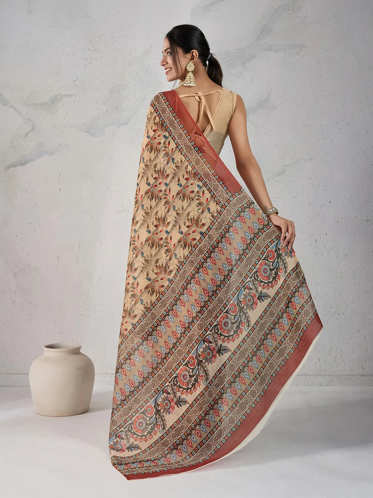 Tarani beige digital print saree back view with tie-up blouse and bold pallu design