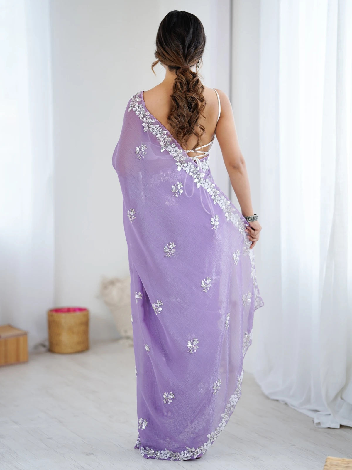 Tarani lavender Chiffon Crush saree back view with graceful drape and embellished border