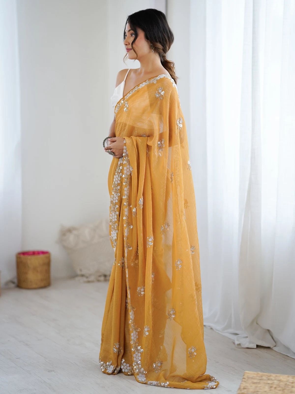 Tarani Amishi mustard chiffon crush saree side view with embroidery
