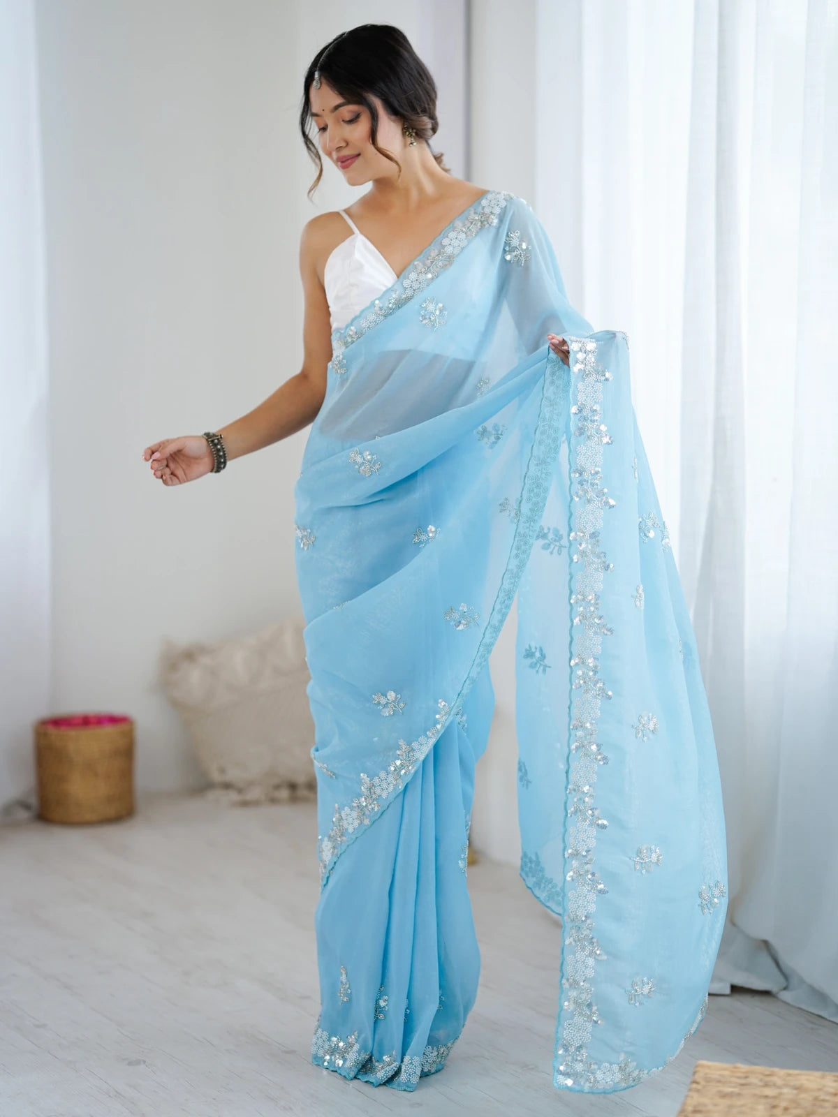Tarani sky blue chiffon crush saree with sequence moti and cut dana work full front drape view