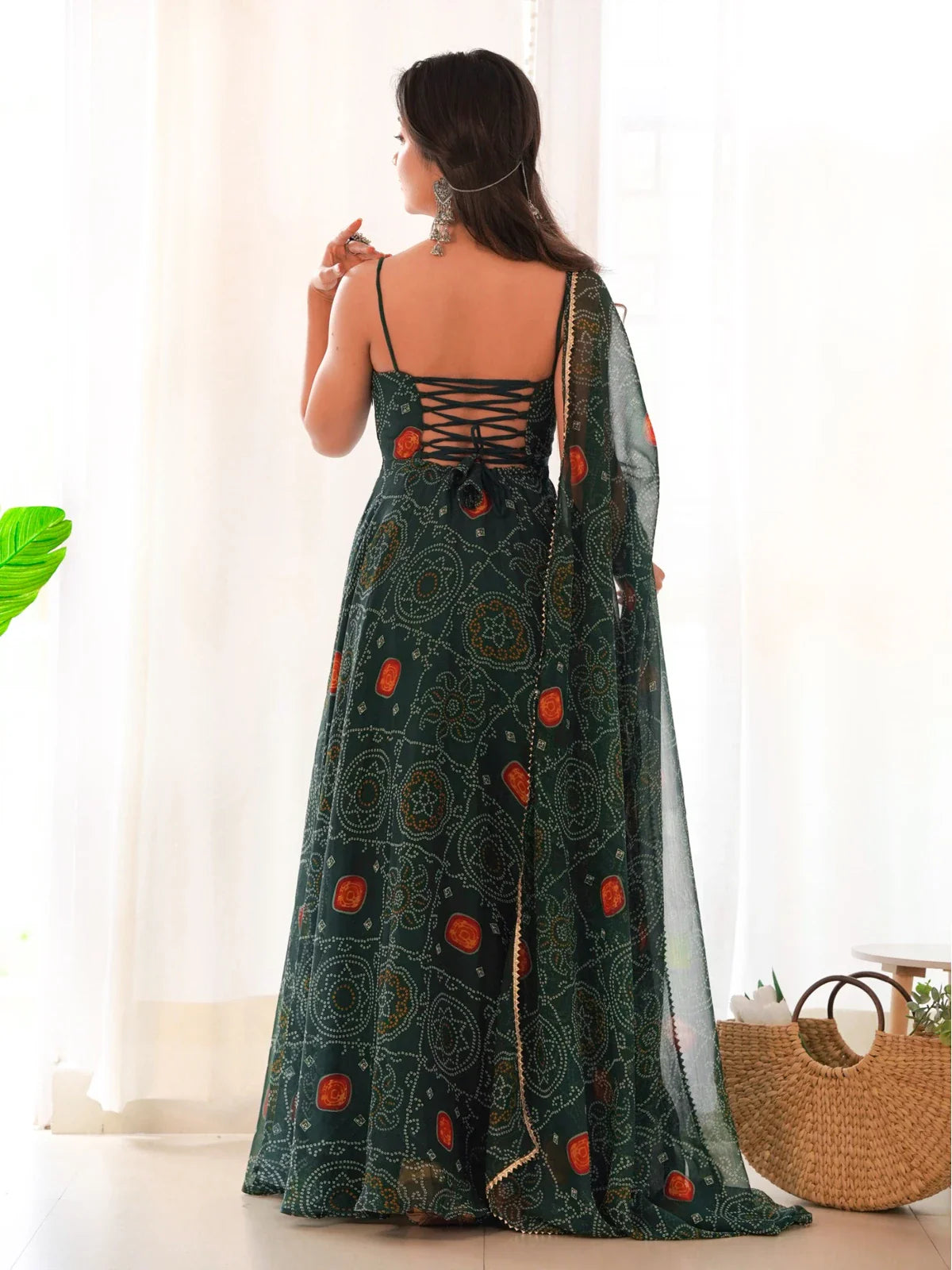 Tarani green chiffon gown showing lace-up back design with dupatta - back view