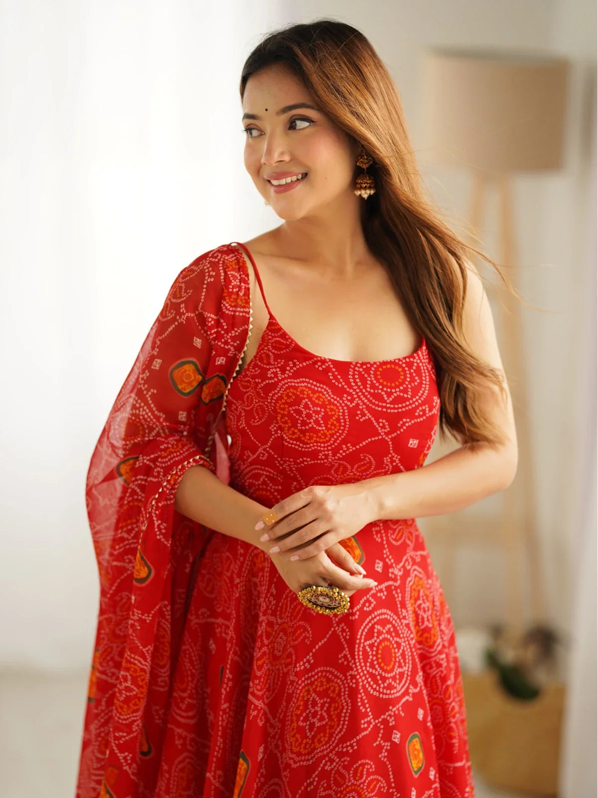 Tarani red chiffon gown upper body closeup with sleeveless neckline for ceremonial wear