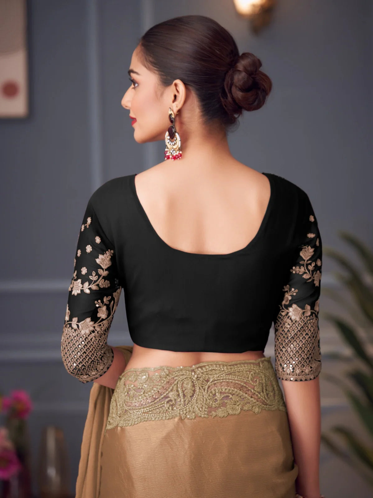 Tarani black embroidered blouse back view paired with brown chiffon silk saree