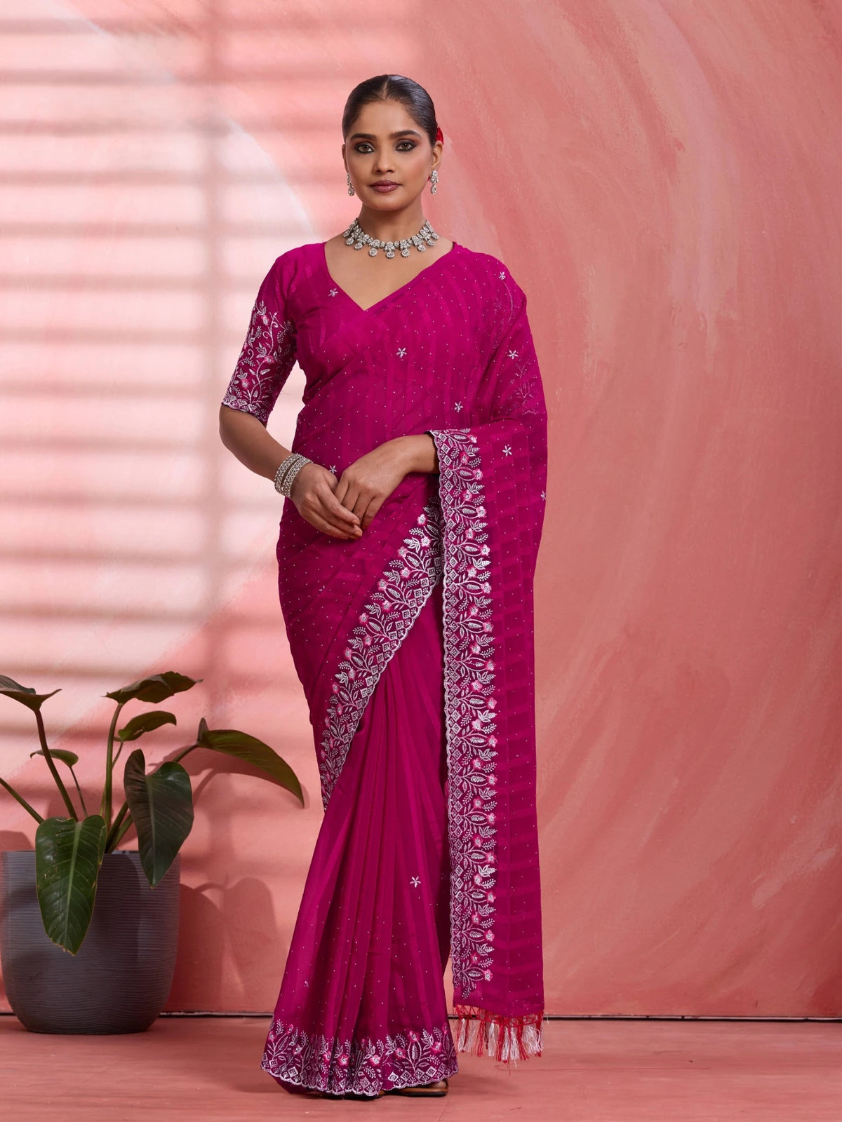 Tarani magenta chiffon saree with multi panel work and embroidered border front full view