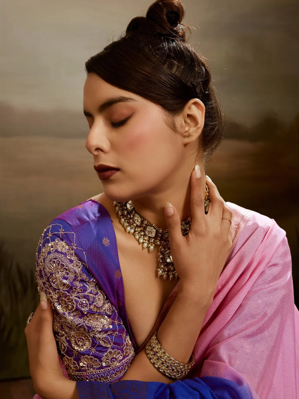 Tarani Aashita designer blouse closeup with handwork sleeves and soft chiffon saree drape