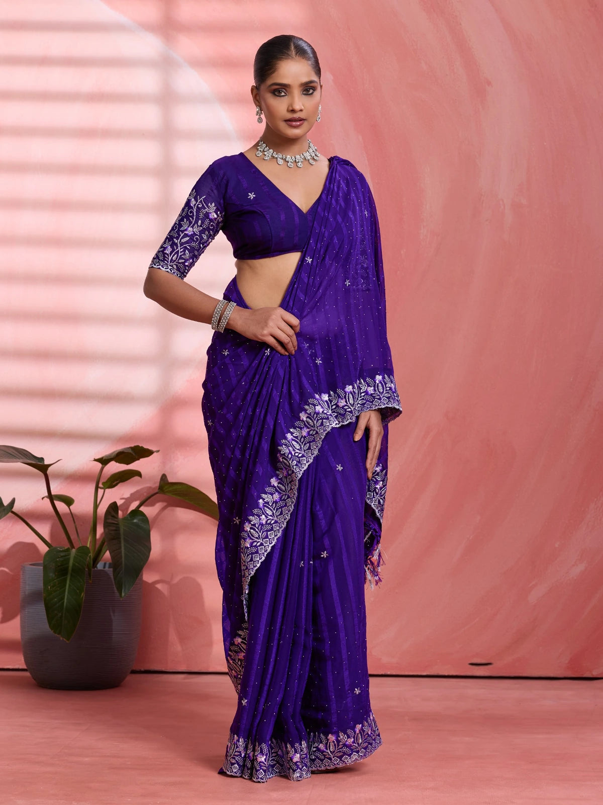 Tarani purple festive chiffon saree front pose with designer border detailing