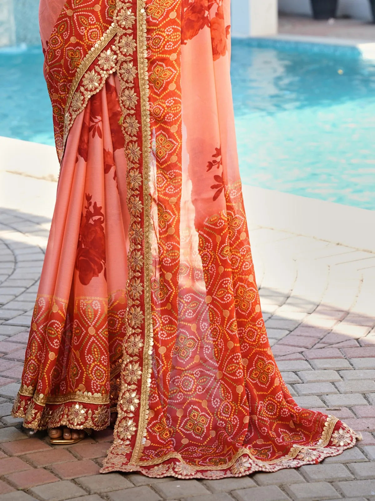 Tarani heavy chiffon saree with floral pallu and intricate golden border details