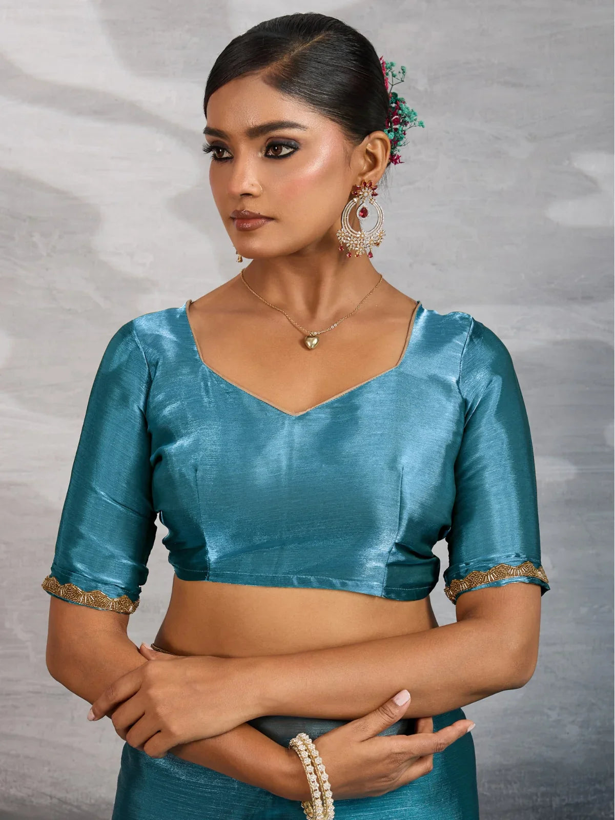 Tarani teal chiffon saree upper body view with V neck blouse and lace sleeve detail