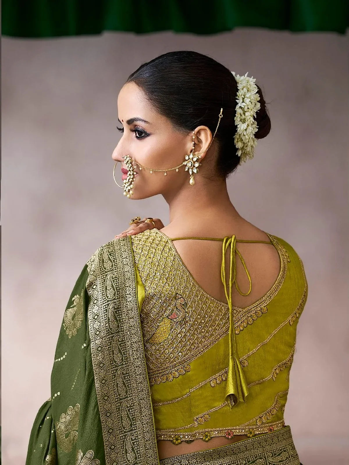Tarani marishi Green Silk saree drape detail view for festive party and wedding wear