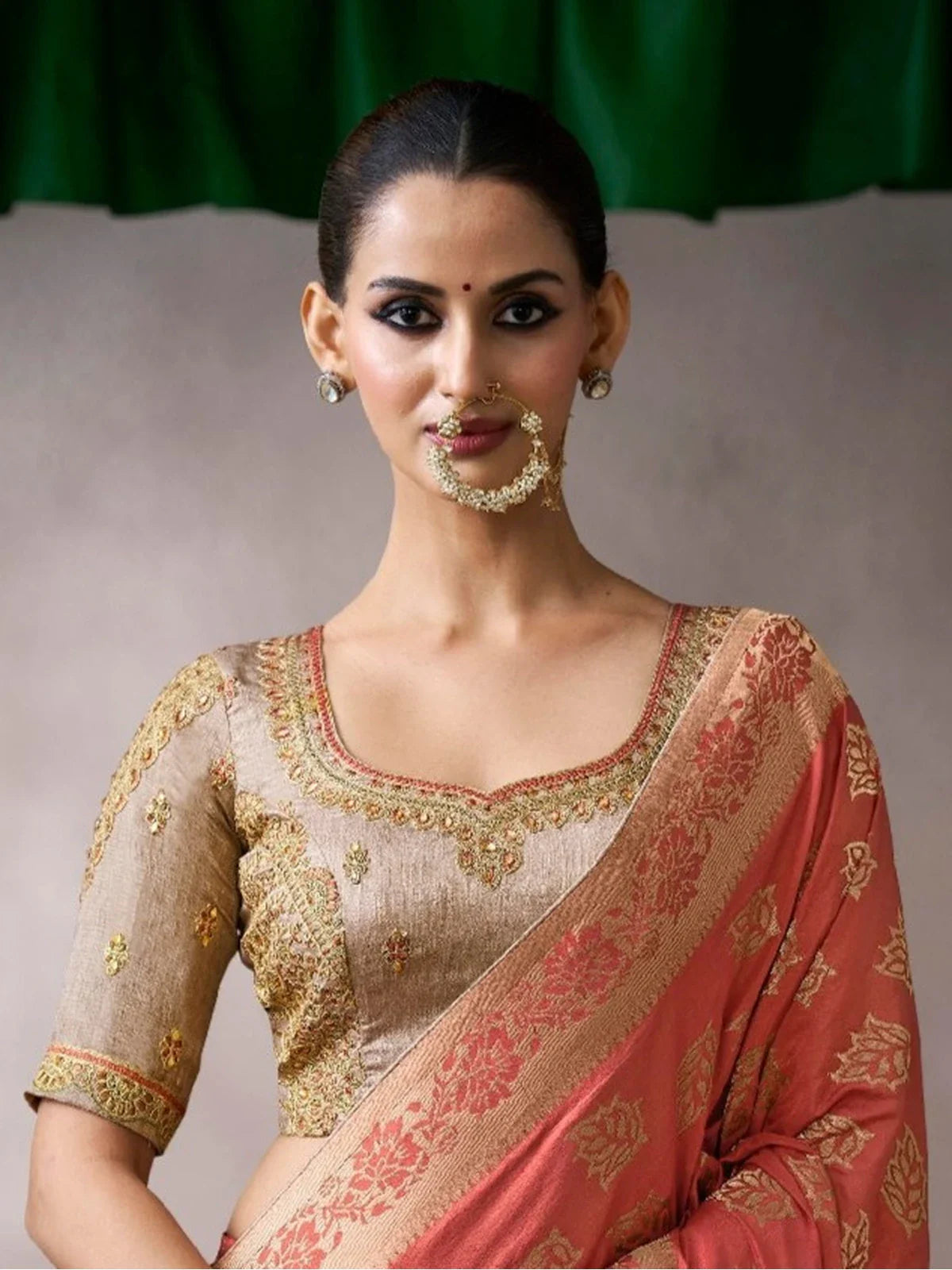 Tarani red chiffon silk saree upper body view with heavy blouse and festive jewellery