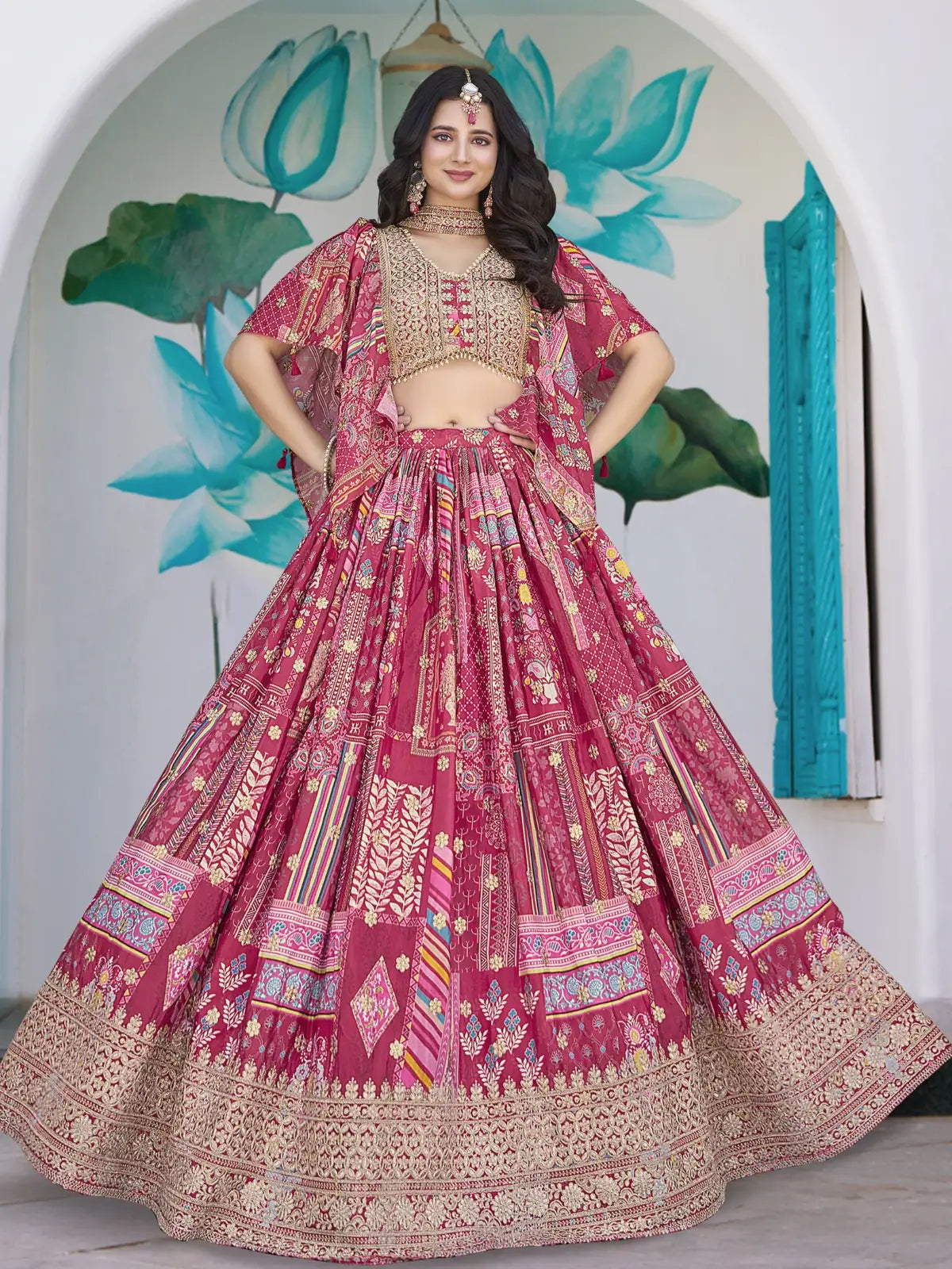 Tarani pink chinnon lehenga with embroidered blouse and golden lace, full front view