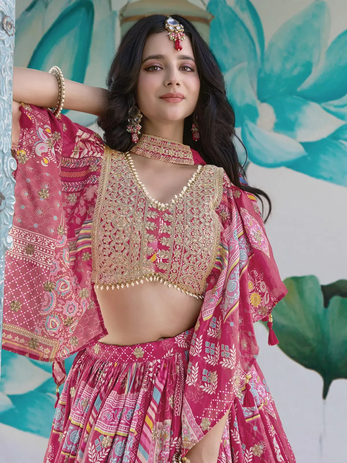 Tarani embroidered pink chinnon blouse with zari and dori work, upper body close-up