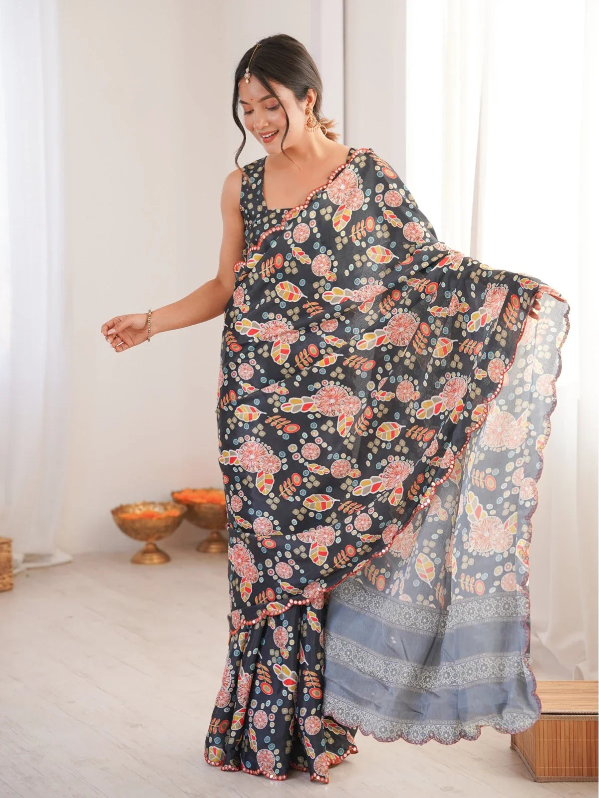 Tarani black chinnon saree full view with printed floral work and mirror border