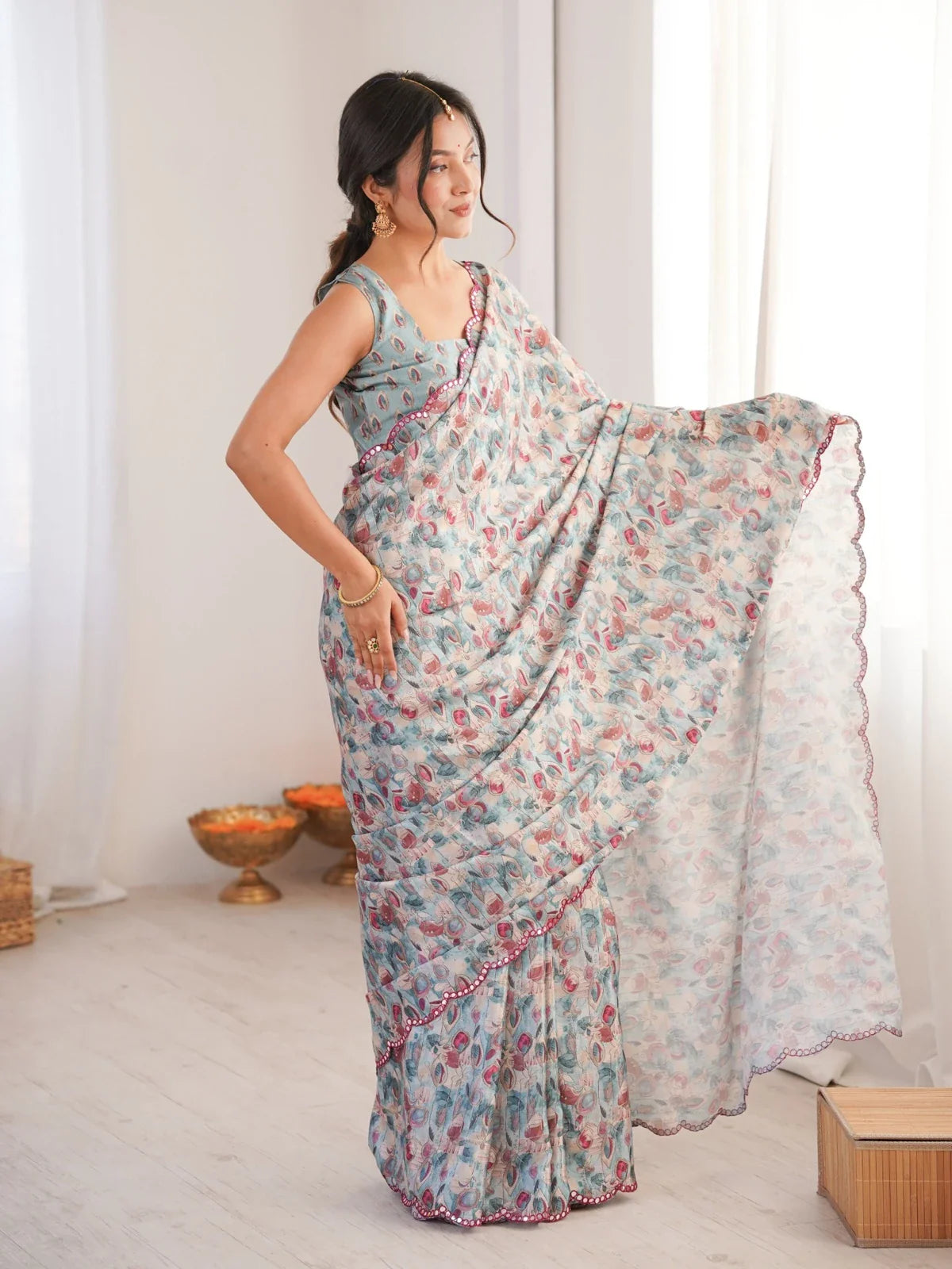 Front pose with elegant drape of Tarani chinnon saree