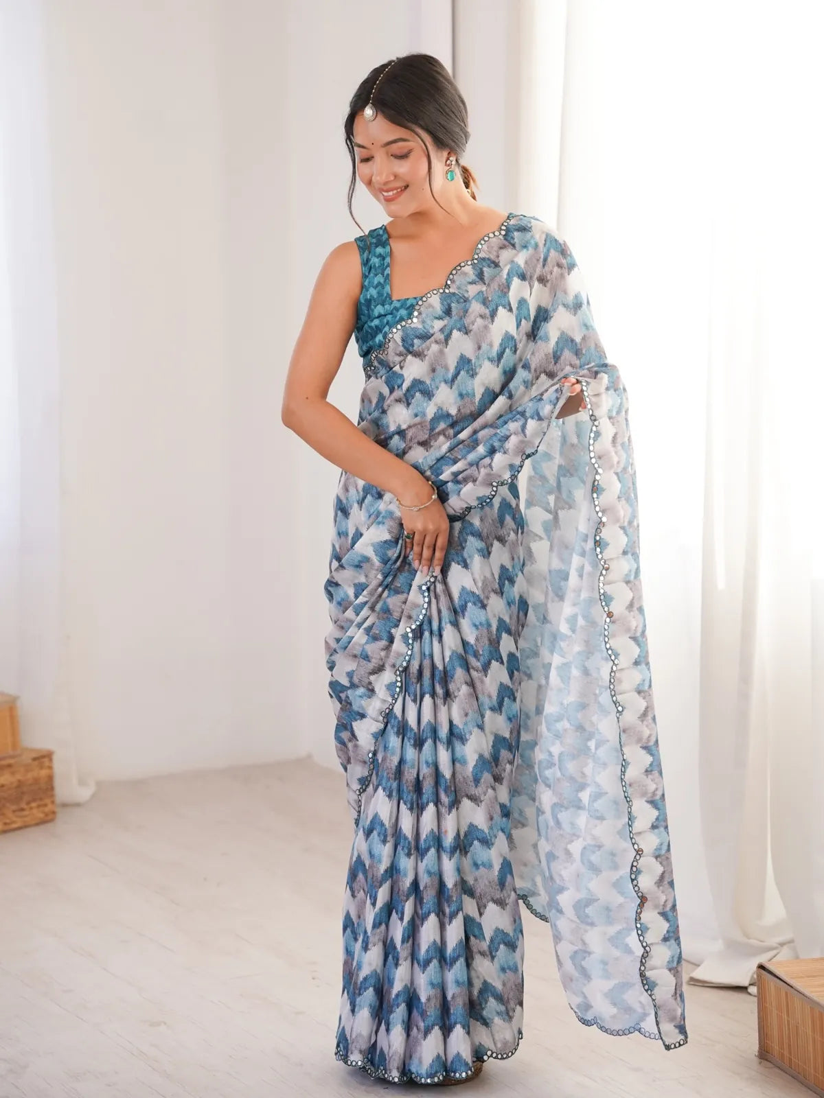 Tarani elegant blue printed chinnon saree with mirror border full view