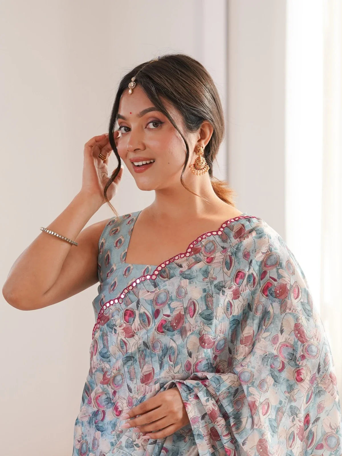 Tarani chinnon saree upper body view with festive blouse