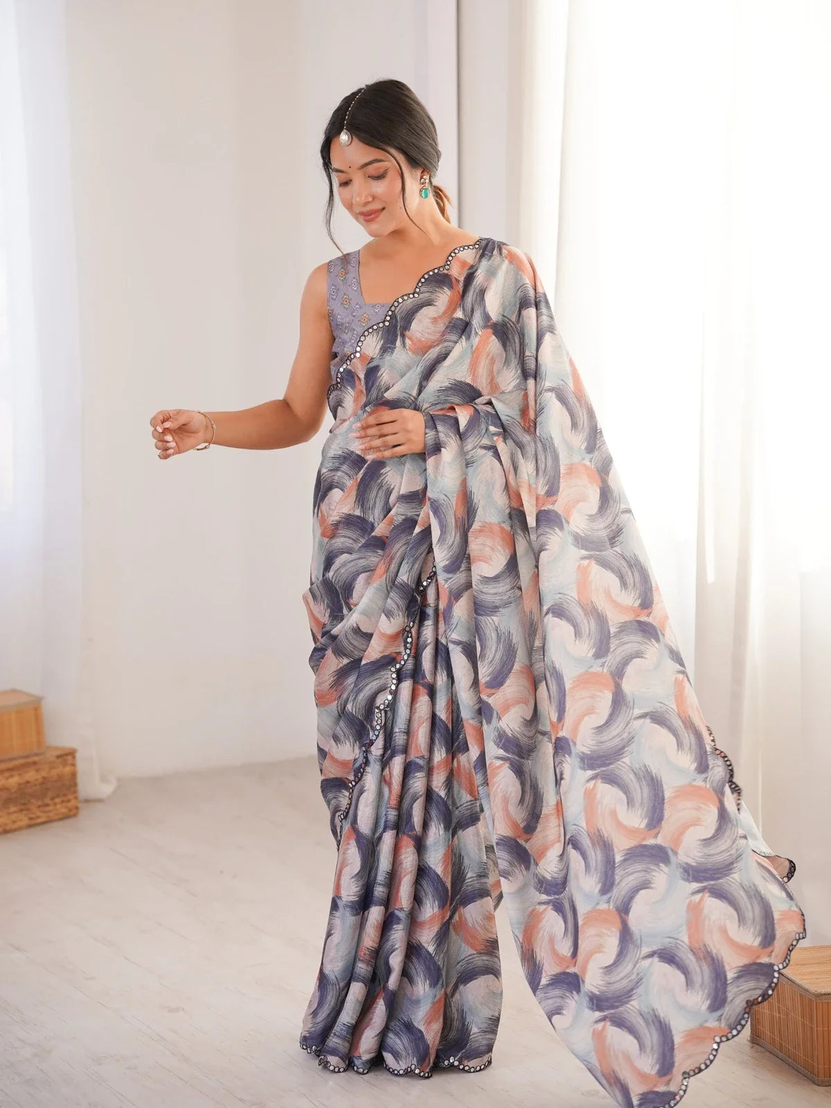 Tarani multicolor chinnon saree full view with printed swirl design and mirror work border