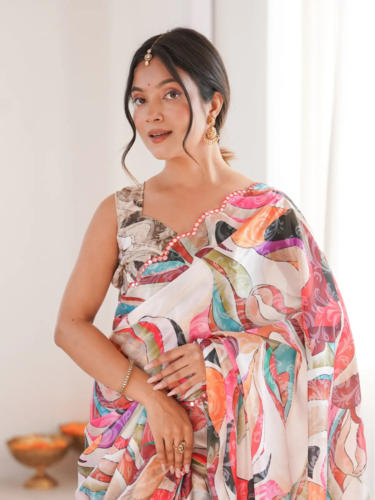 Tarani chinnon saree upper body view showing blouse and elegant drape