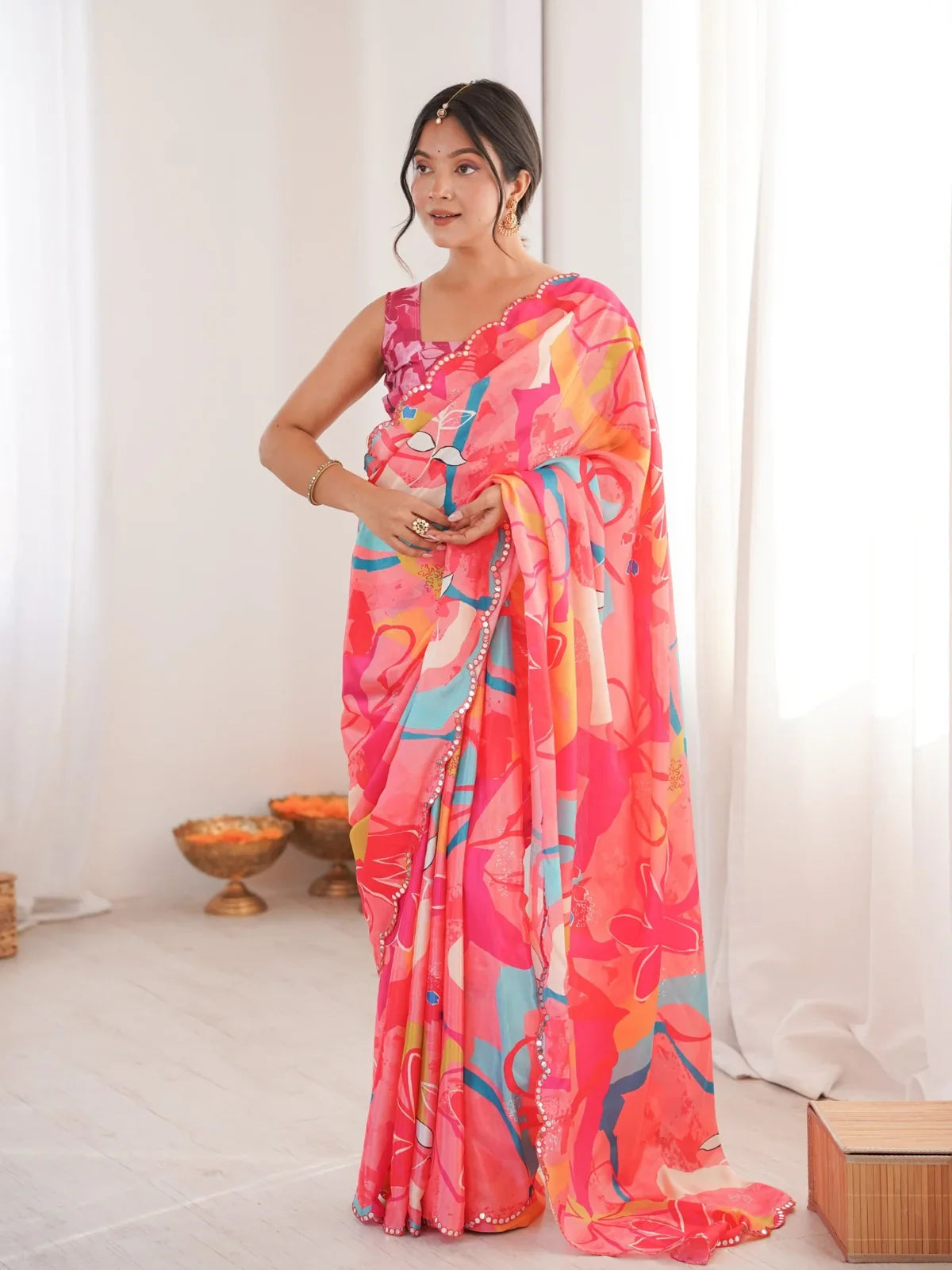 Tarani pink chinnon saree full view with abstract floral print and scallop mirror work border