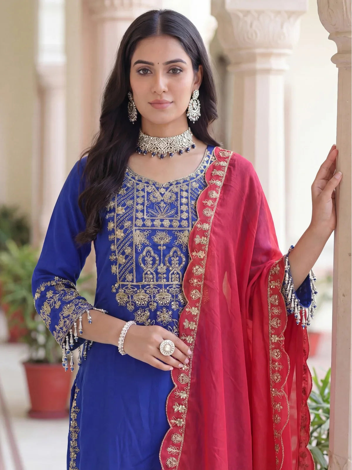 Tarani embroidered chinon dress upper body view with royal neckline and red dupatta