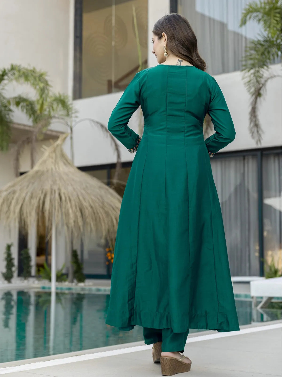 Tarani green Chinon dress full back view with flared silhouette