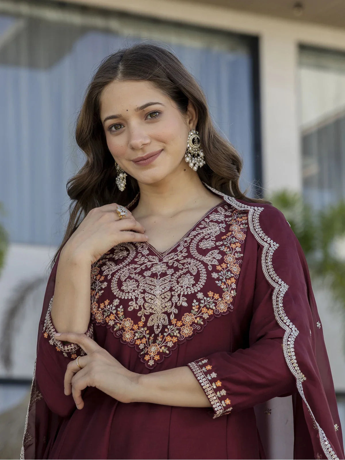 Tarani embroidered neckline and sleeves on maroon chinon dress close up view