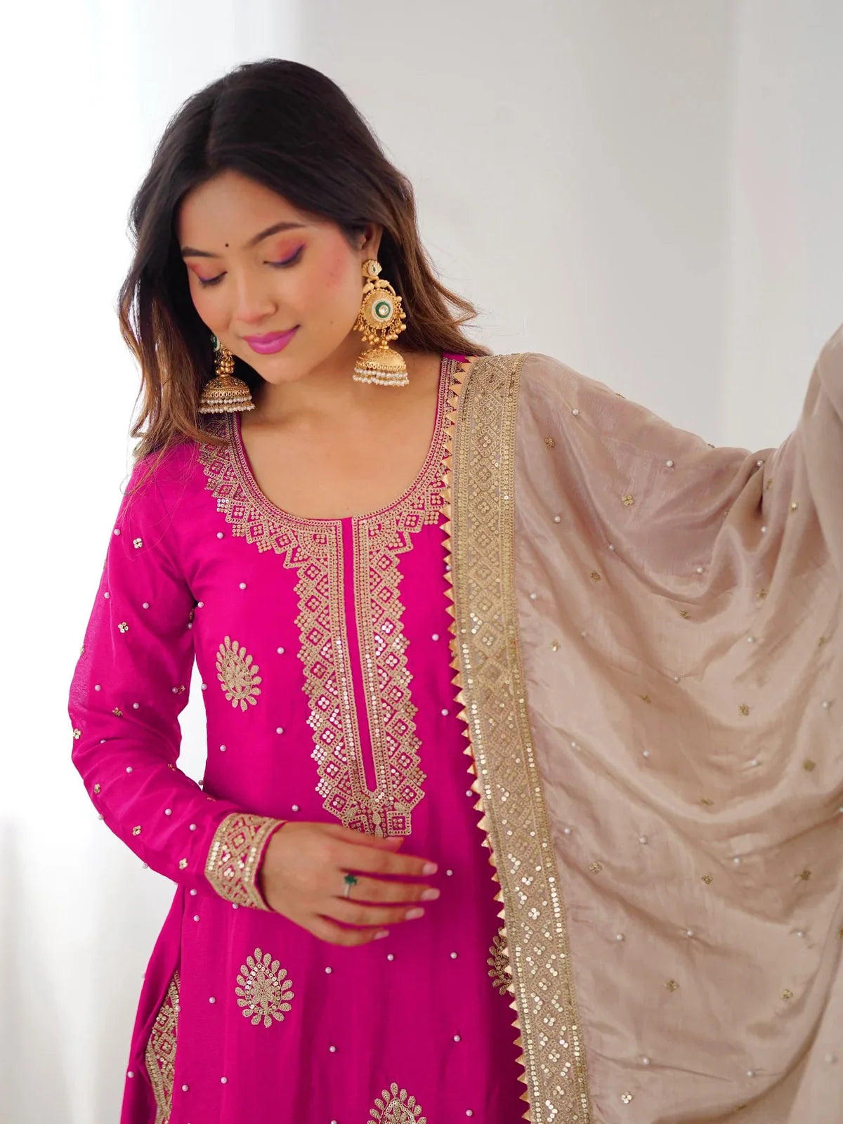 Tarani pink Chinon dress close-up showing neckline and sequin embroidery work