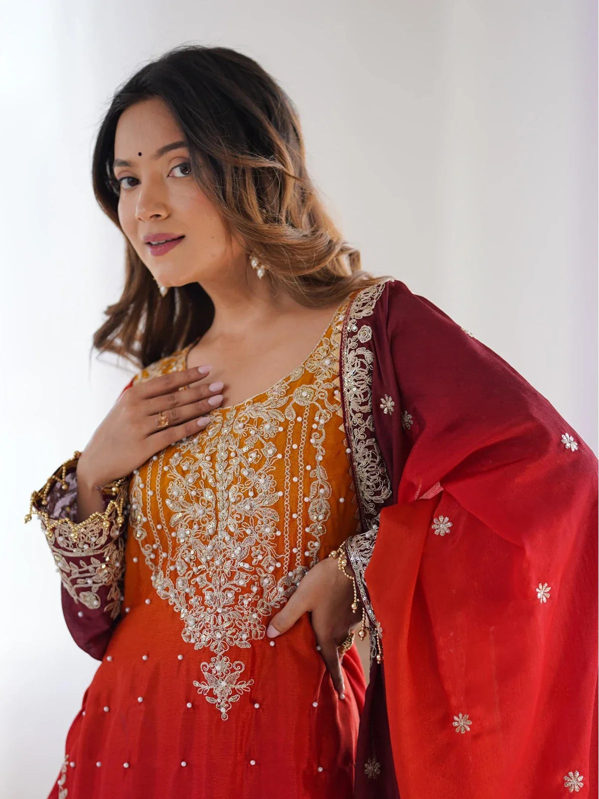 Tarani embroidered red chinon silk dress showing close-up neckline and sleeve work
