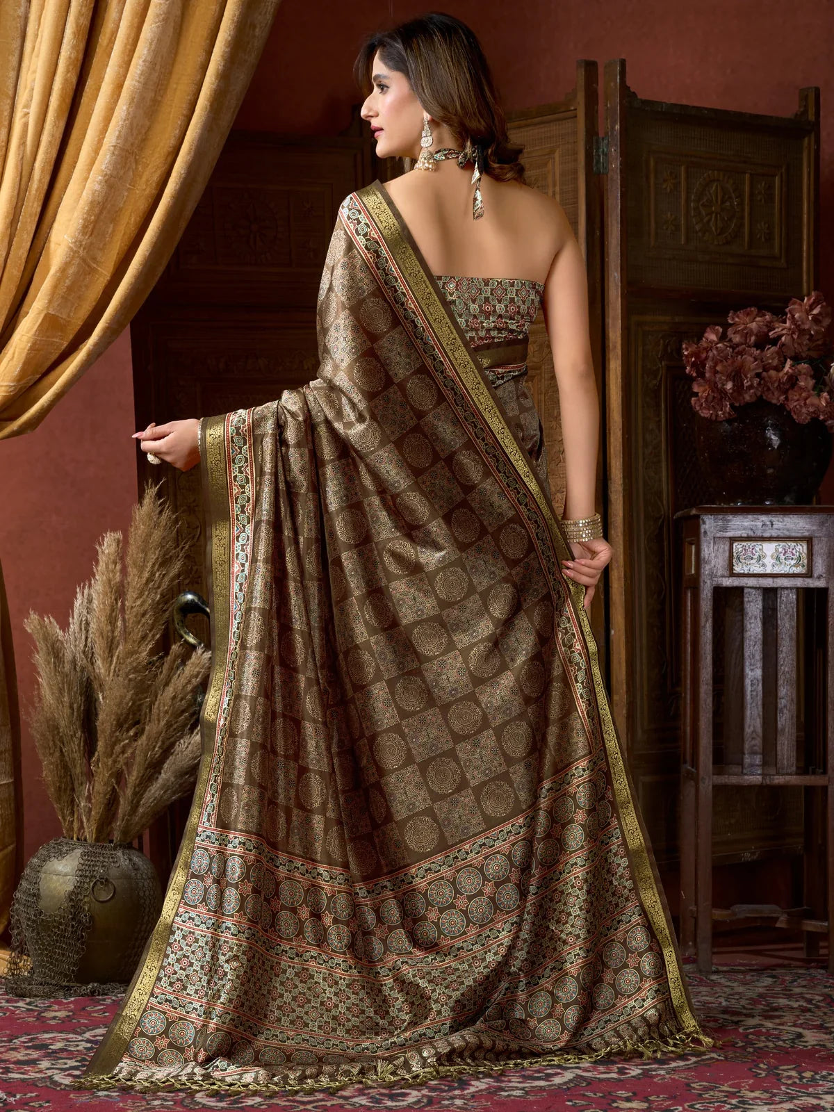Tarani back view of brown cluster digital saree with elegant drape and printed blouse
