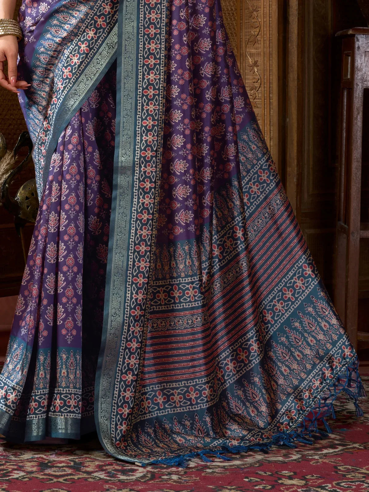 Tarani closeup of ajrakh digital print and jacquard border with tassels
