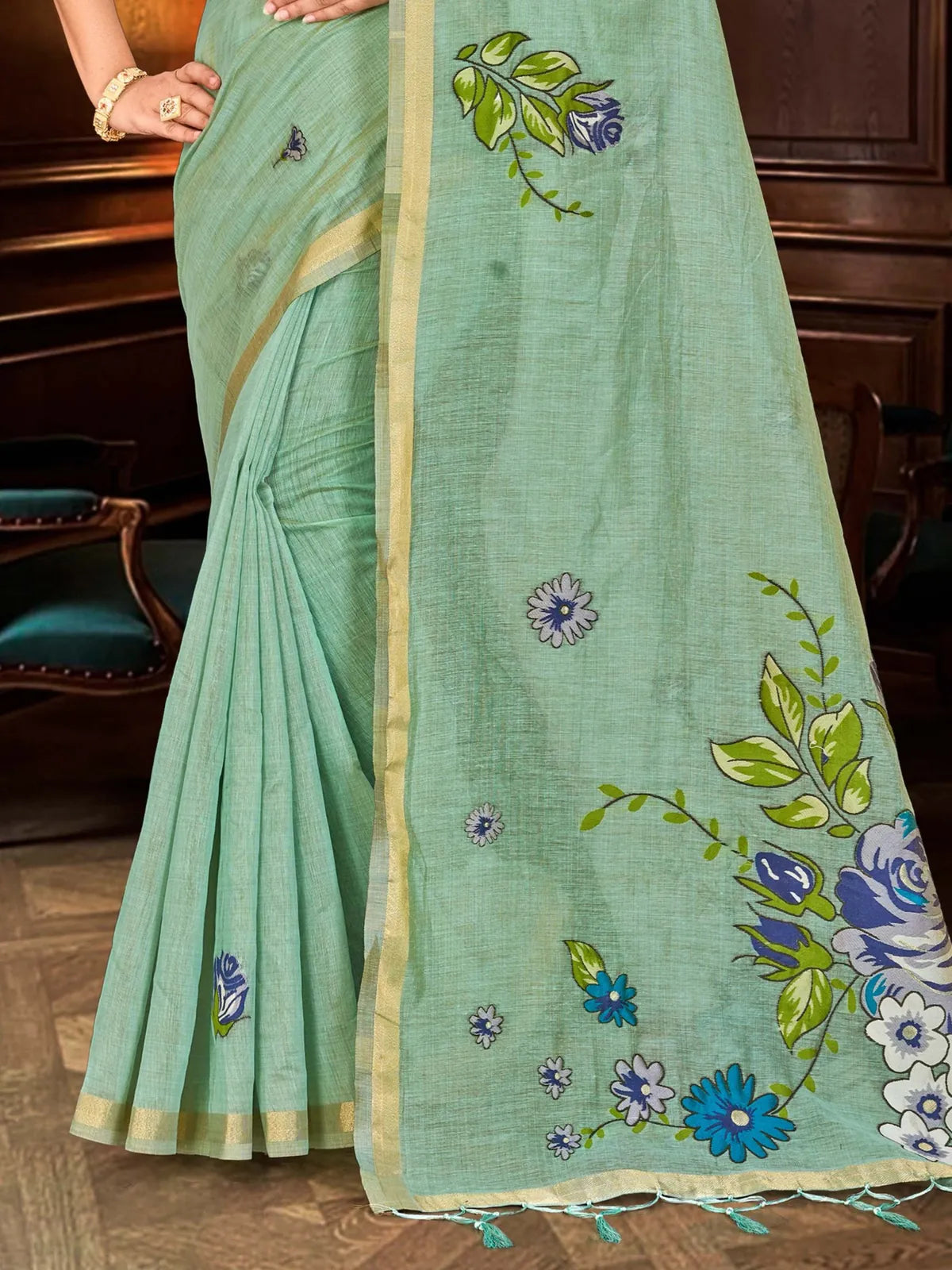 Tarani mint green cotton blend saree pallu close view with floral weaving