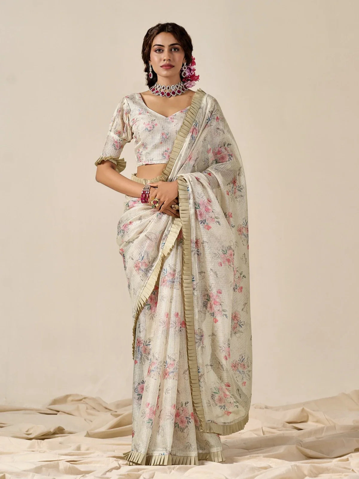 Tarani off white cotton blend Kota saree with floral design and pleated border for festive wear