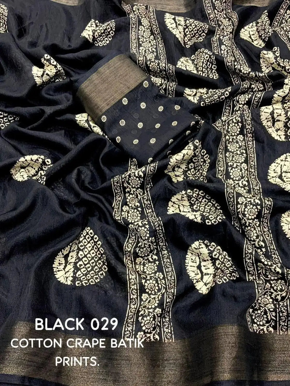 Tarani black batik print cotton crape saree close-up showcasing detailing and border