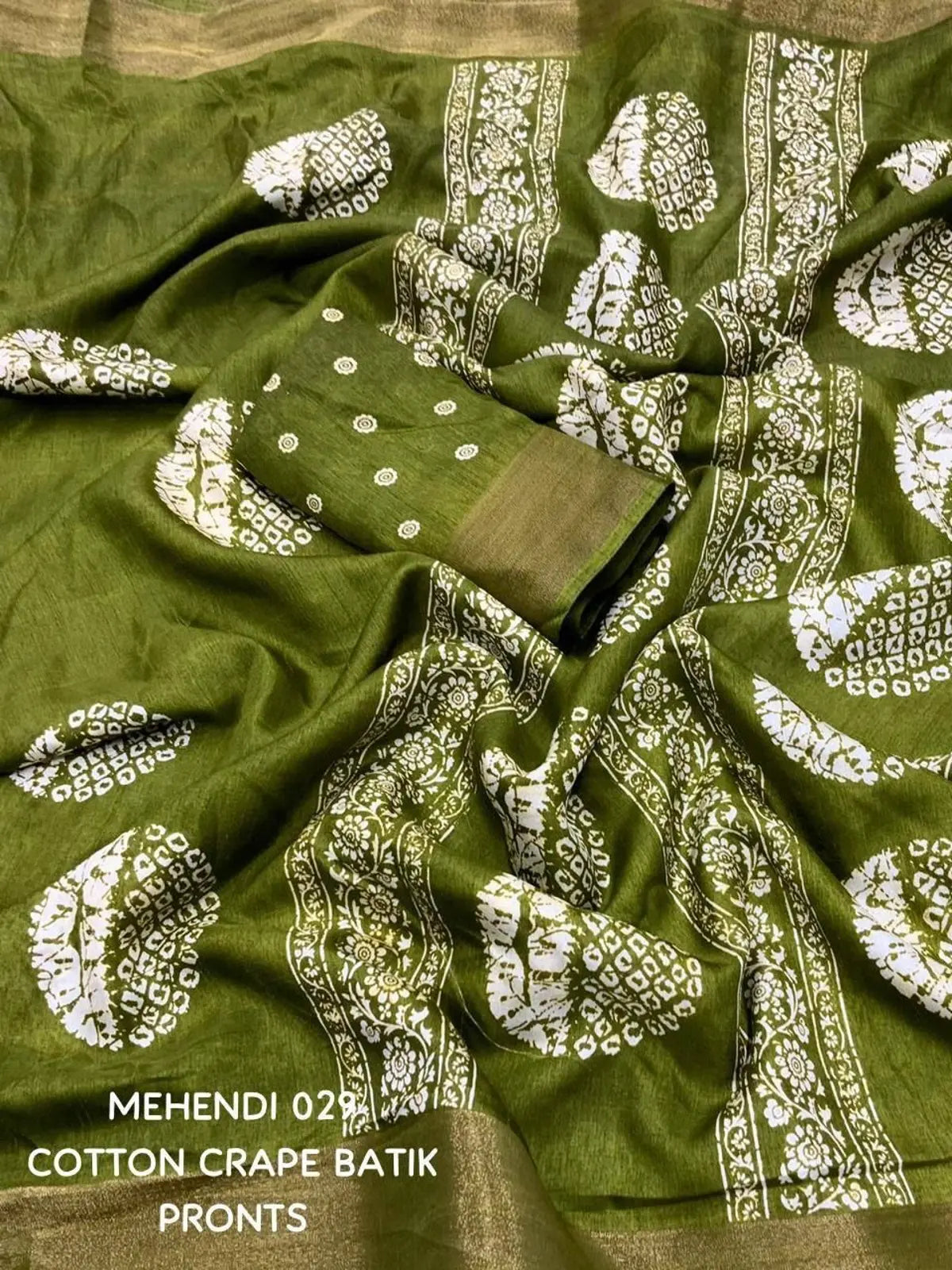 Tarani mehendi cotton crape batik saree fabric closeup view with border detailing